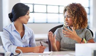 Two women talking 